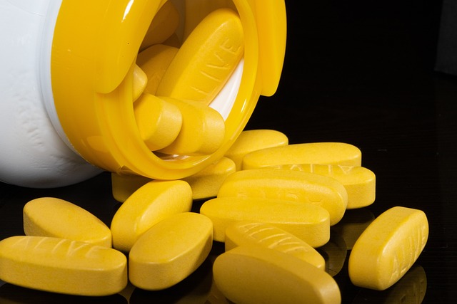 yellow capsules in bulk out of bottle for self-medication