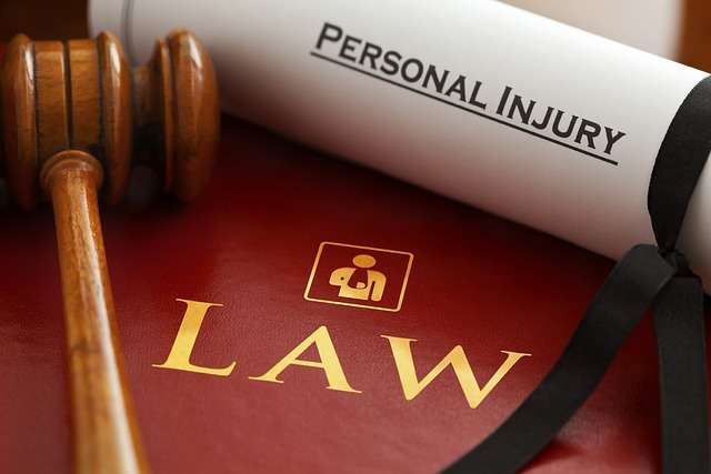 image of two papers with personal injury law on them and a gavel personal injury lawyer