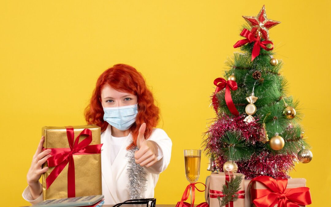 female doctor with Christmas tree and gifts Christmas tree allergies